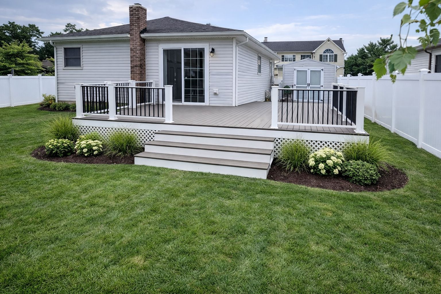 Low maintenance composite decking in grey tones
