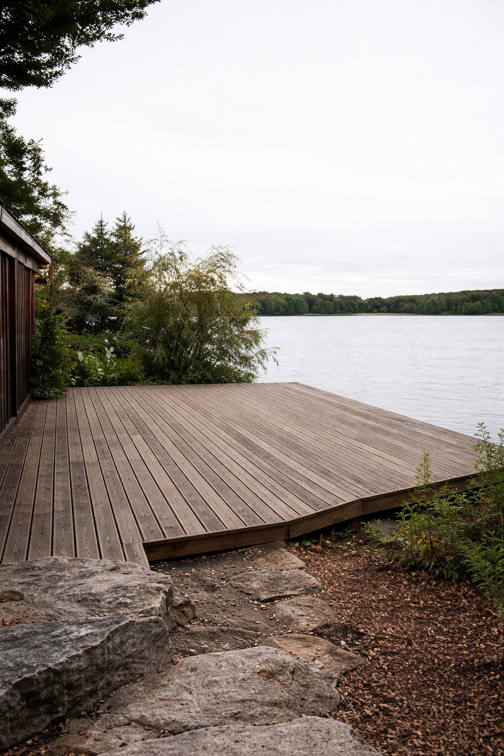 Modern composite deck with glass railing