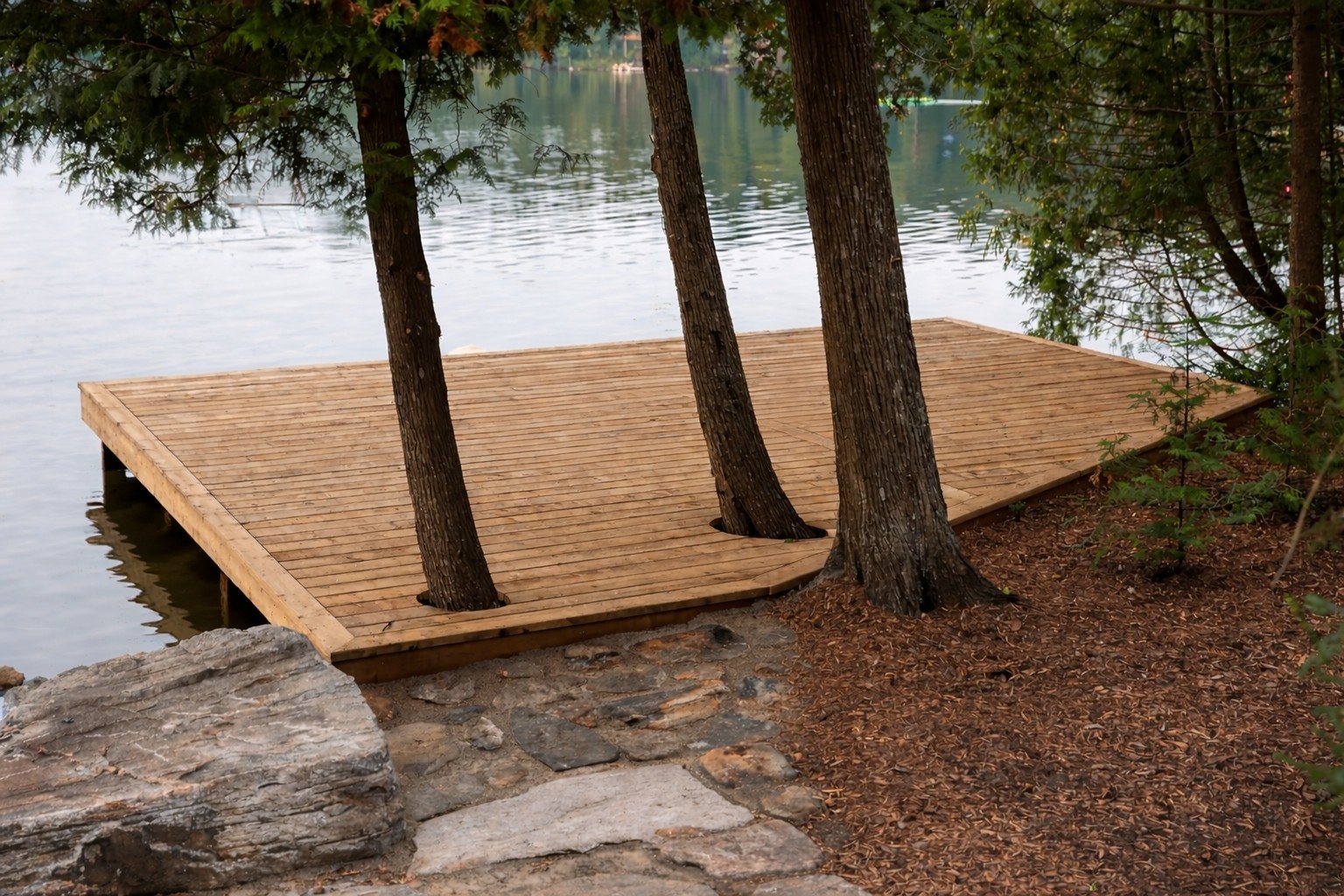 Pool deck with modern railing around inground pool